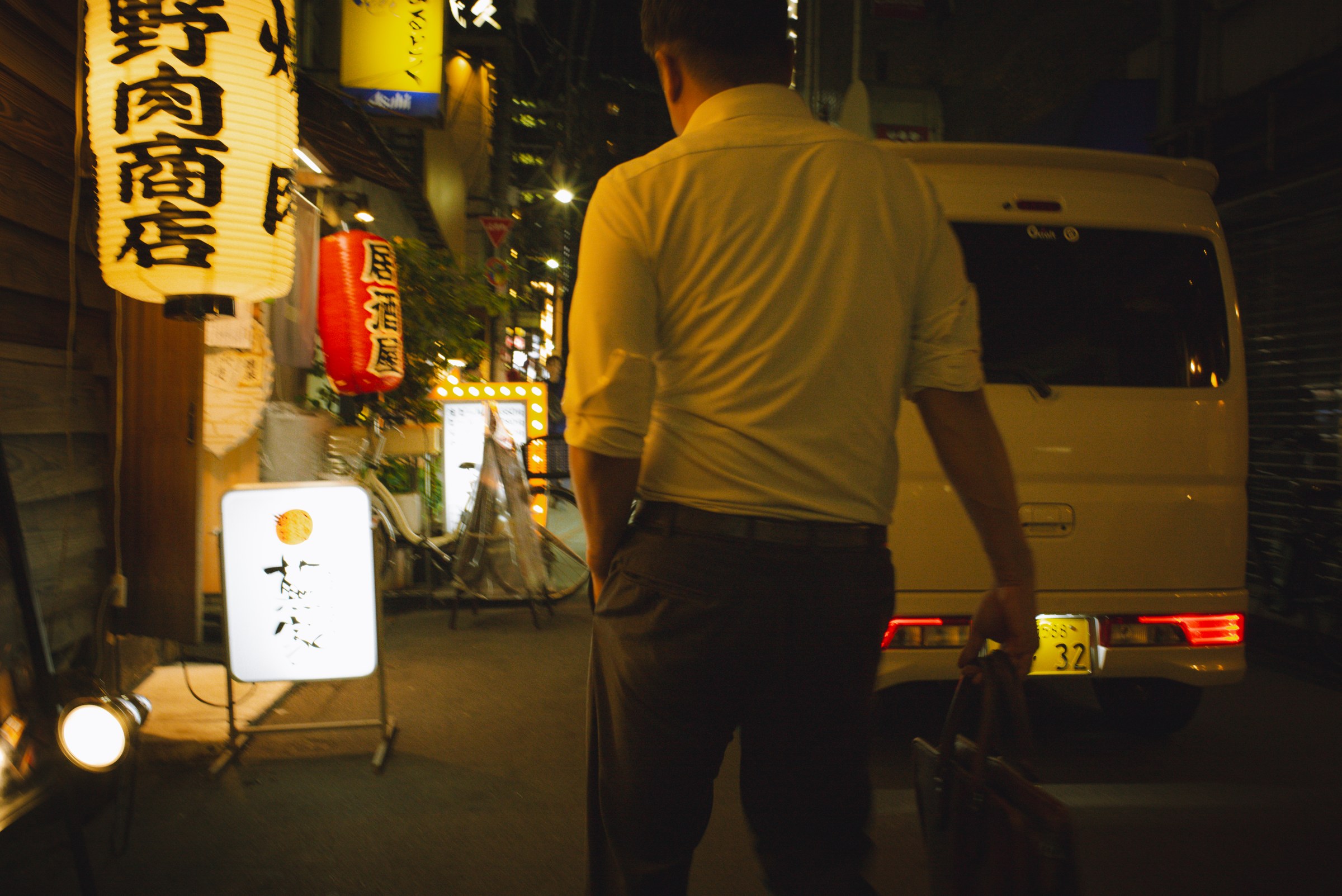 A man coming back home after the party.